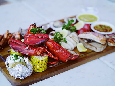 cooked food on brown wooden serving tray thumbnail