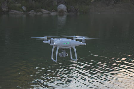white done on top body of water thumbnail