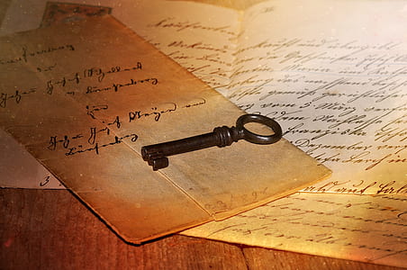 black skeleton key on brown paper thumbnail