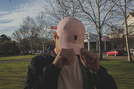 Man Holding White Bunny Fitted Cap thumbnail