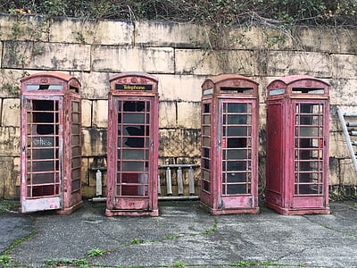 four red telephone booths thumbnail