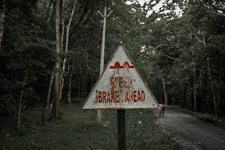 white and brown steel road signage thumbnail