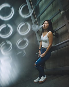 woman smoking inside room thumbnail