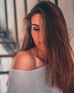 Photography of Woman in Gray Sweater thumbnail