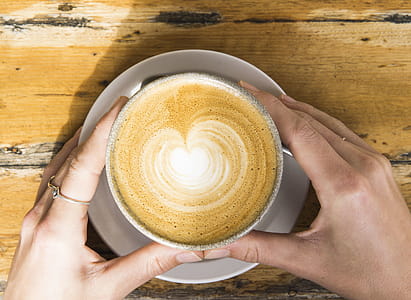 Brown and White Latte on White Ceramic Cup thumbnail