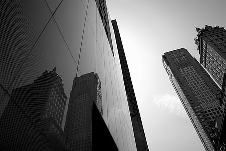 grayscale photography of city buildings thumbnail