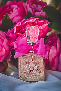 Gray and Pink Labeled Fragrance Bottle thumbnail