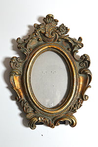 gold photo frame on white surface thumbnail