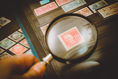 magnifying glass showing postage stamp thumbnail