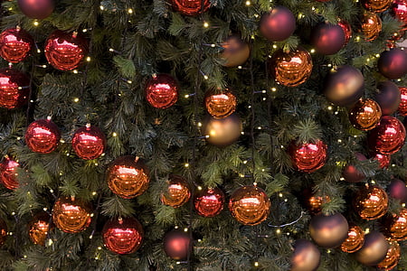 green Christmas tree with hanging red and brown baubles thumbnail