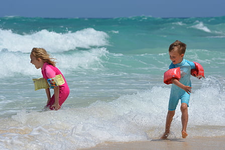 girl and boy on seashore thumbnail