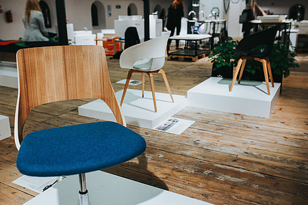 Various designer chairs and tables on an exhibition thumbnail