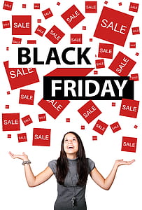 woman pointing Black Friday signage thumbnail