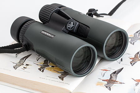 black range finder on top of book thumbnail