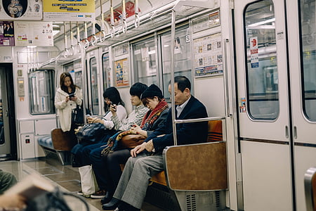 people sitting inside train thumbnail