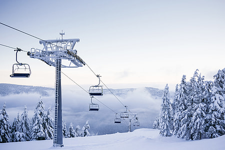Empty Chair Ski Lift on Bright Winter Day thumbnail