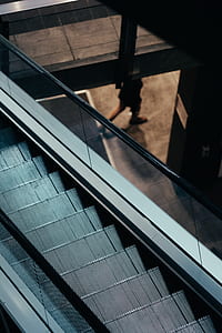 person walking outside the building thumbnail