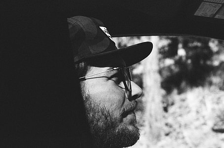 grayscaled photo of man thumbnail