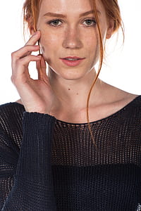 portrait photography of woman holding her hair thumbnail