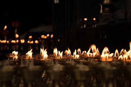 beige lighted candles thumbnail