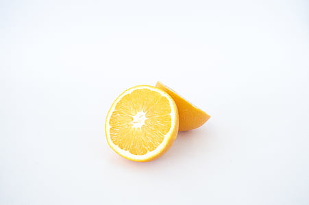 sliced lemon on white surface thumbnail