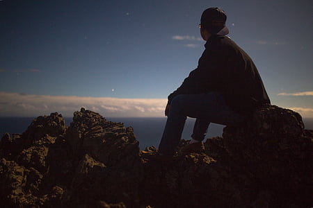 man sitting rock thumbnail