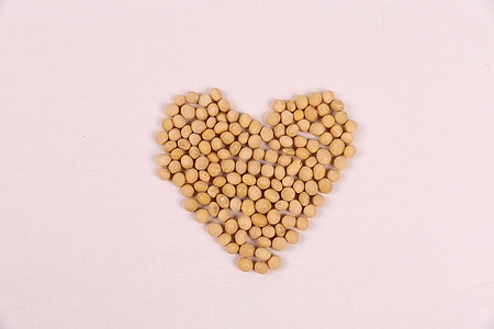 beige pebbles shaped into heart thumbnail