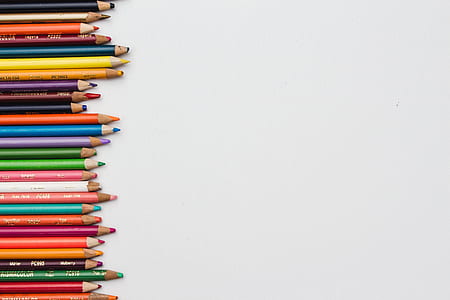 pile of coloring pencils on top of white surface thumbnail