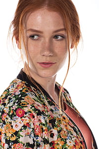 woman in floral top with white background thumbnail