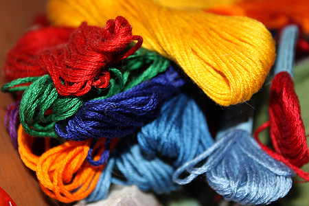 assorted-colored yarn in close-up photography thumbnail