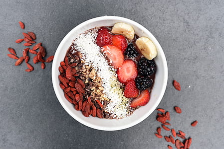cereal with strawberry, blackberries and banana in a bowl thumbnail