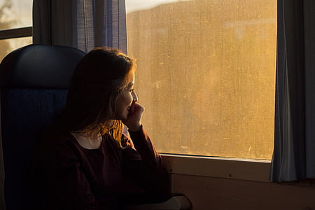 woman smiling in front of glass window thumbnail