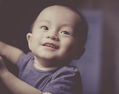 Close-Up Photography of a Smiling baby thumbnail