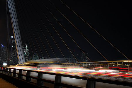 time-lapse photography of cars on bridge during daytime thumbnail