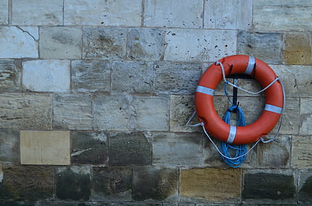 orange buoy ring on wall thumbnail