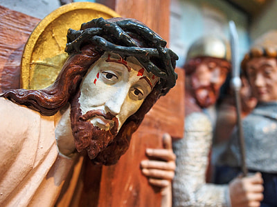 shallow depth of field photo of Jesus Christ figurine thumbnail