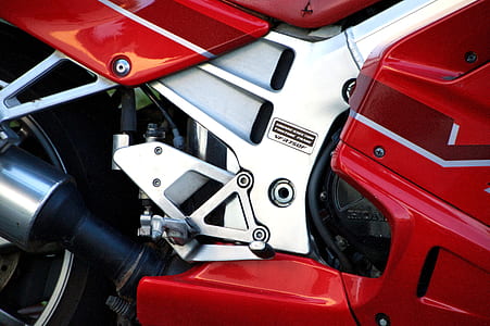 close-up photography of red and gray motorcycle thumbnail