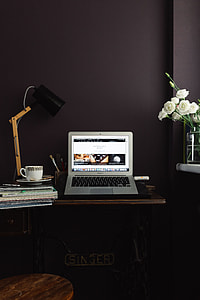 Contemporary home office idea with dark walls thumbnail