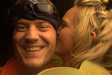woman kissing man's cheek thumbnail