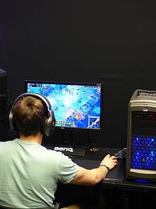 boy holding computer mouse while playing MMORPG game thumbnail