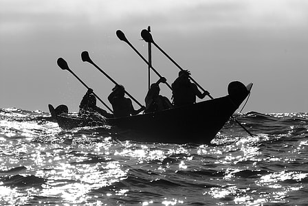 People rowing a canoe in Channel Islands National Park, California thumbnail