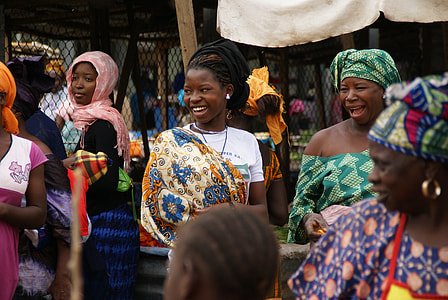 people in traditional garments gathering thumbnail