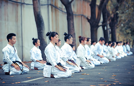 group of people meditating on floor thumbnail