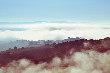aerial view of mountains and clouds thumbnail