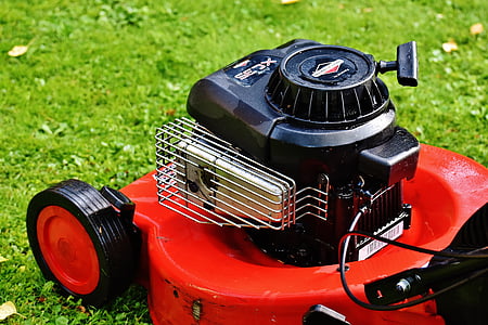 lawnmower on grass field thumbnail