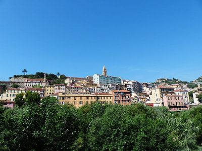 assorted color houses under blue sky thumbnail
