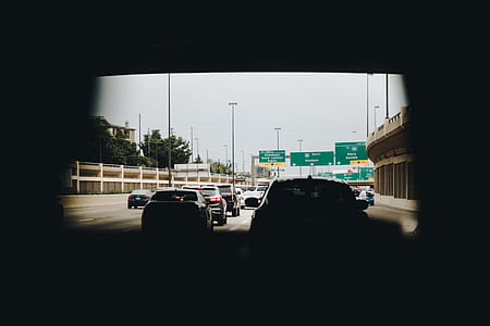 vehicle passing road during daytime thumbnail