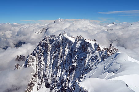 bird's eye view of mountain covered by snow thumbnail