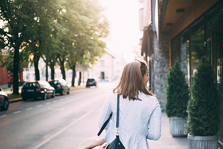 Woman Walking Near Road thumbnail