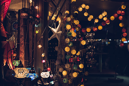 assorted-color string lights hang on in room decors thumbnail
